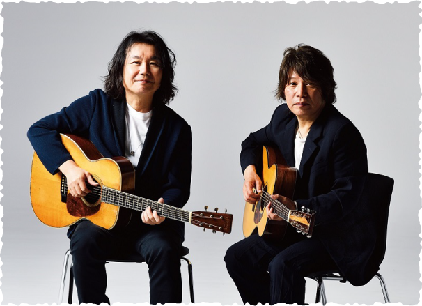 山弦（小倉 博和 ＋ 佐橋 佳幸）